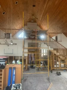 Interior structural restoration with scaffolding on a WV job site